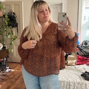 Sheer floral balloon sleeve tie back top